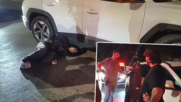 Otomobiliyle ters yöne girince yakalandı: Polise direnip, gazetecilere tükürdü